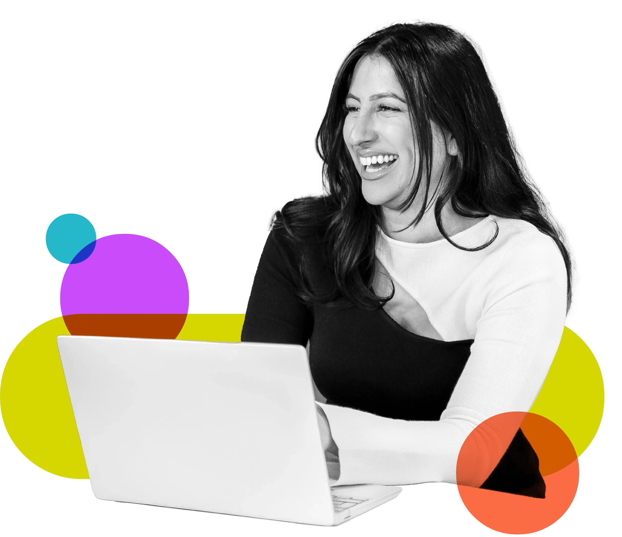 Benita smiling at a laptop